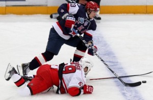 SKA St. Petersburg's Shitikov fights for the puck with Carolina Hurricanes' LaRose during their international friendly ice hockey game in St. Petersburg SKA St. Petersburg's Shitikov fights for the puck with Carolina Hurricanes' LaRose during their international friendly ice hockey game in St. Petersburg