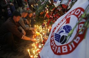 Mourning Lokomotiv Yaroslavl Mourners place flowers at a makeshift memorial to the crash victims.